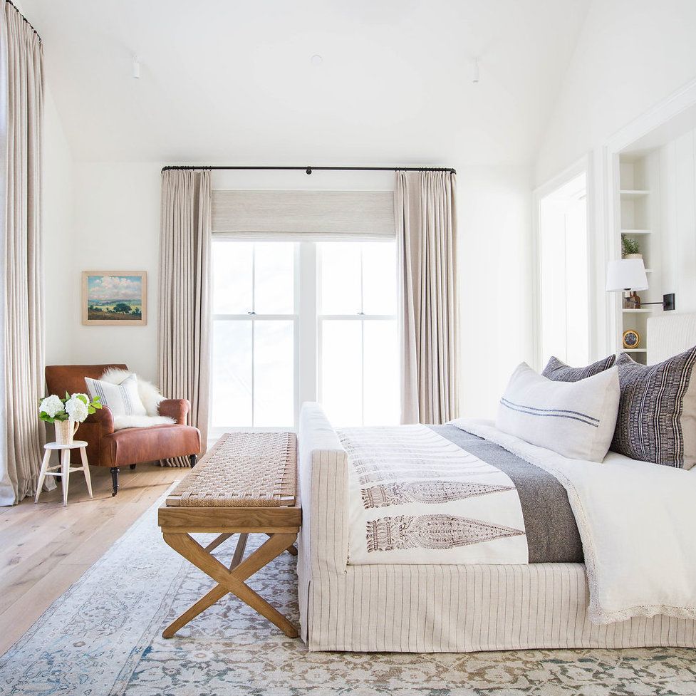 Wood bench in discount front of bed