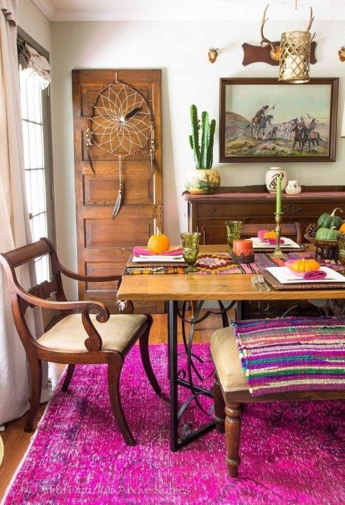 Bohemian Dining Room with Magenta rug and Wood Furniture