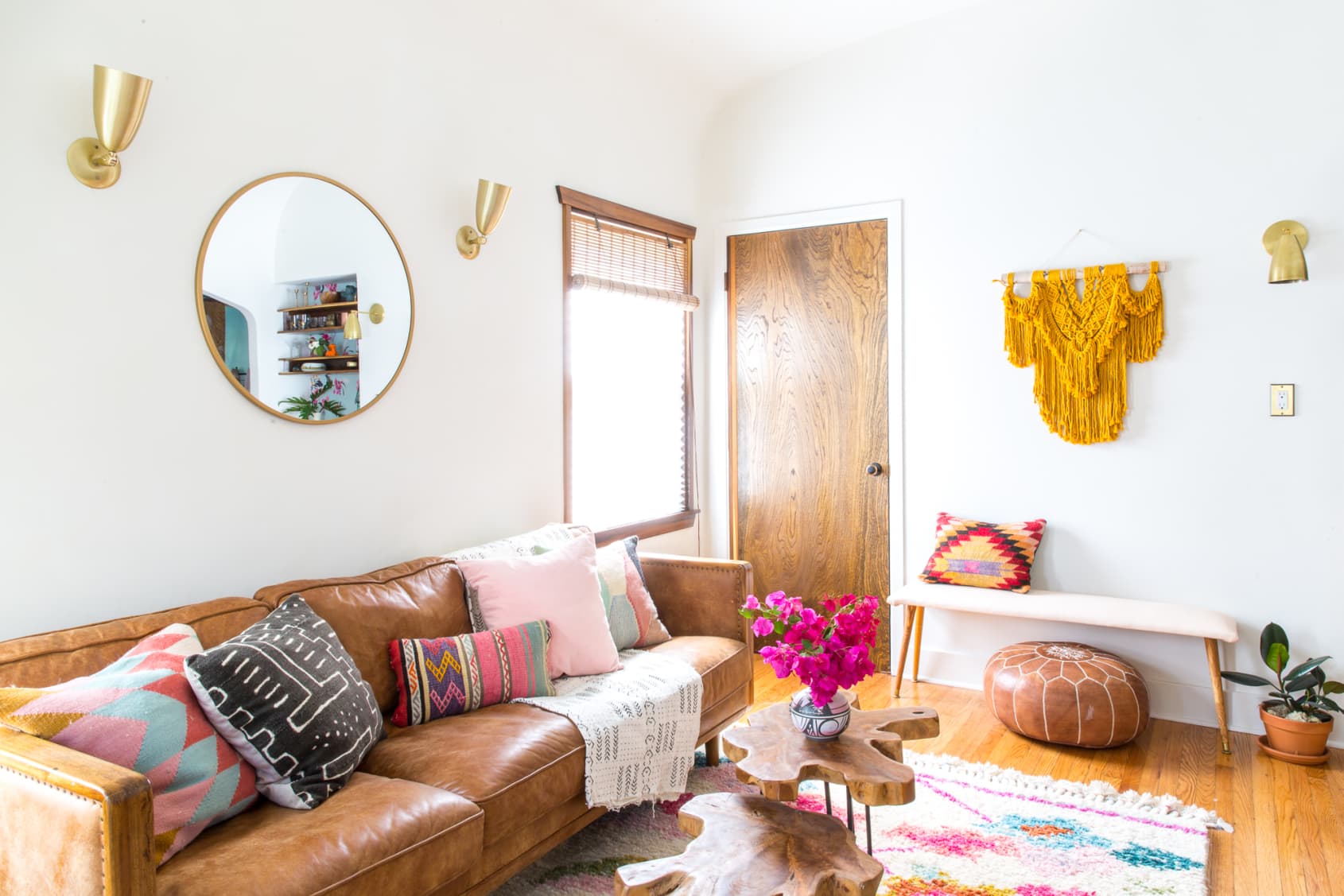 Bohemian Living Room with Brown Leather Sofa via Samantha Santana