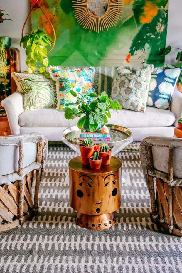 Bohemian Living Room with Copper Garden Stool via Jungalow