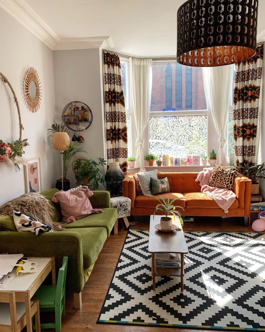 Bohemian Living Room with Earth Tones like Green Brown and Orange via @at_home_at_170