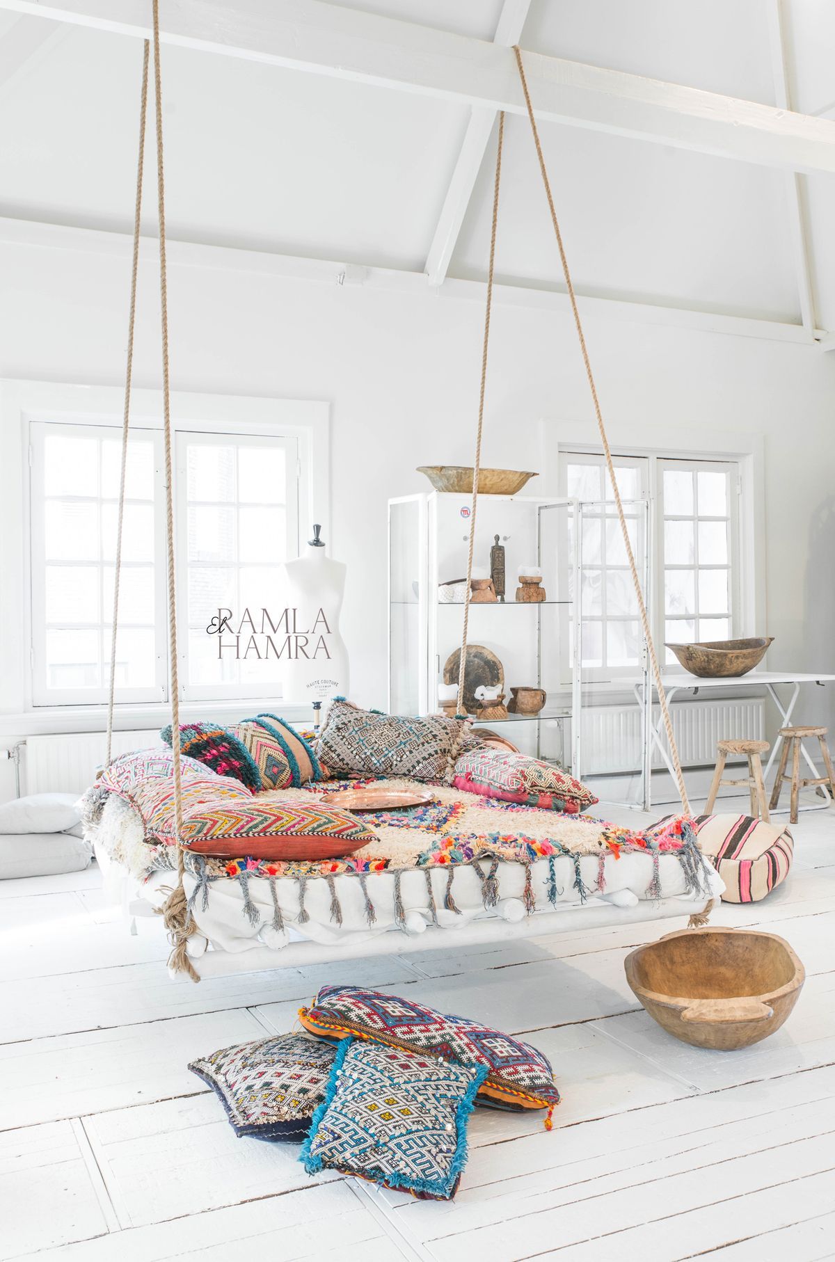 Bohemian Living Room with Hanging Bed via Paulina Arcklin