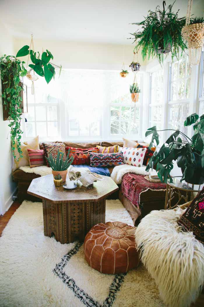 Bohemian Living Room Decor with Leather Moroccan Poof via Carley Summers Design Sponge