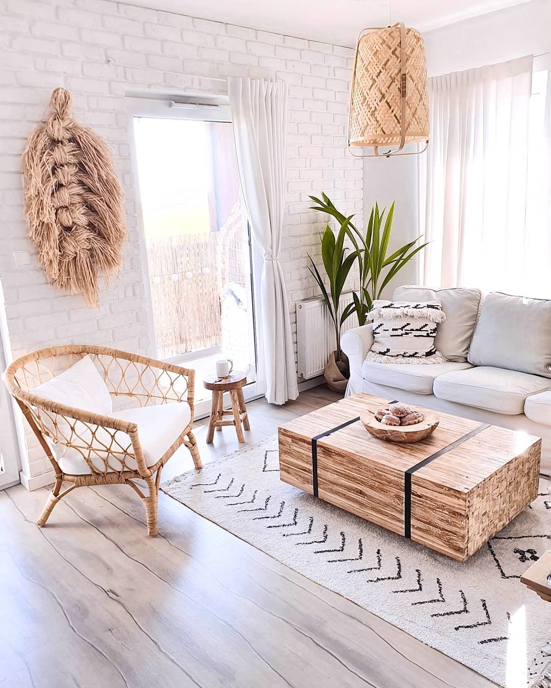 Bohemian Living Room with Natural Wood Furniture via @oliv.home