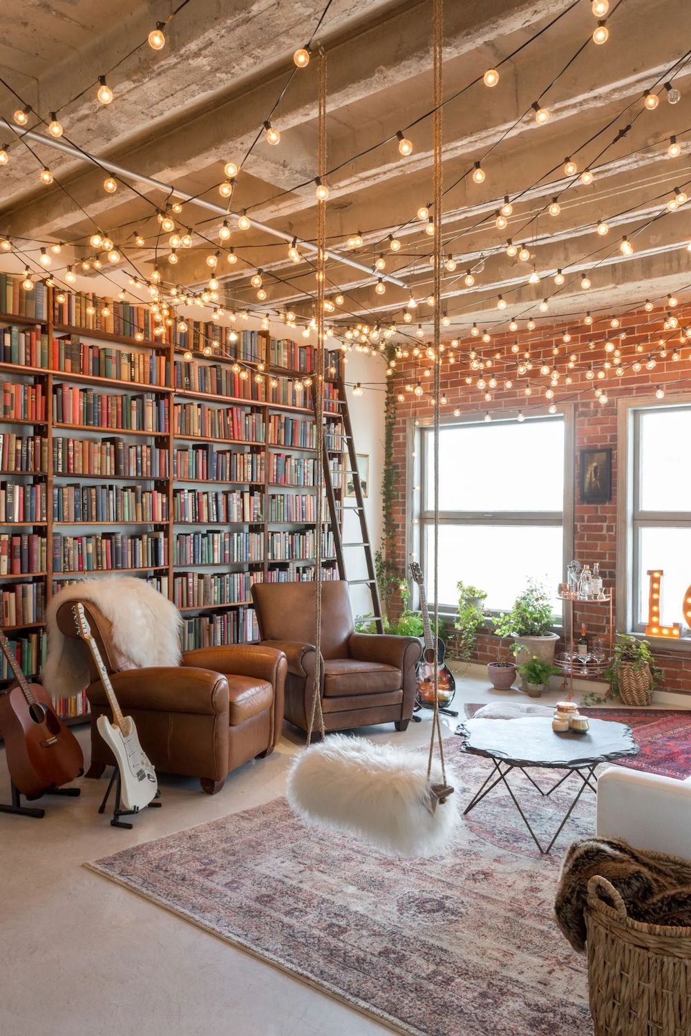 Bohemian Living Room with Swing and String Lights via Gabrielle Aker Apartment Therapy