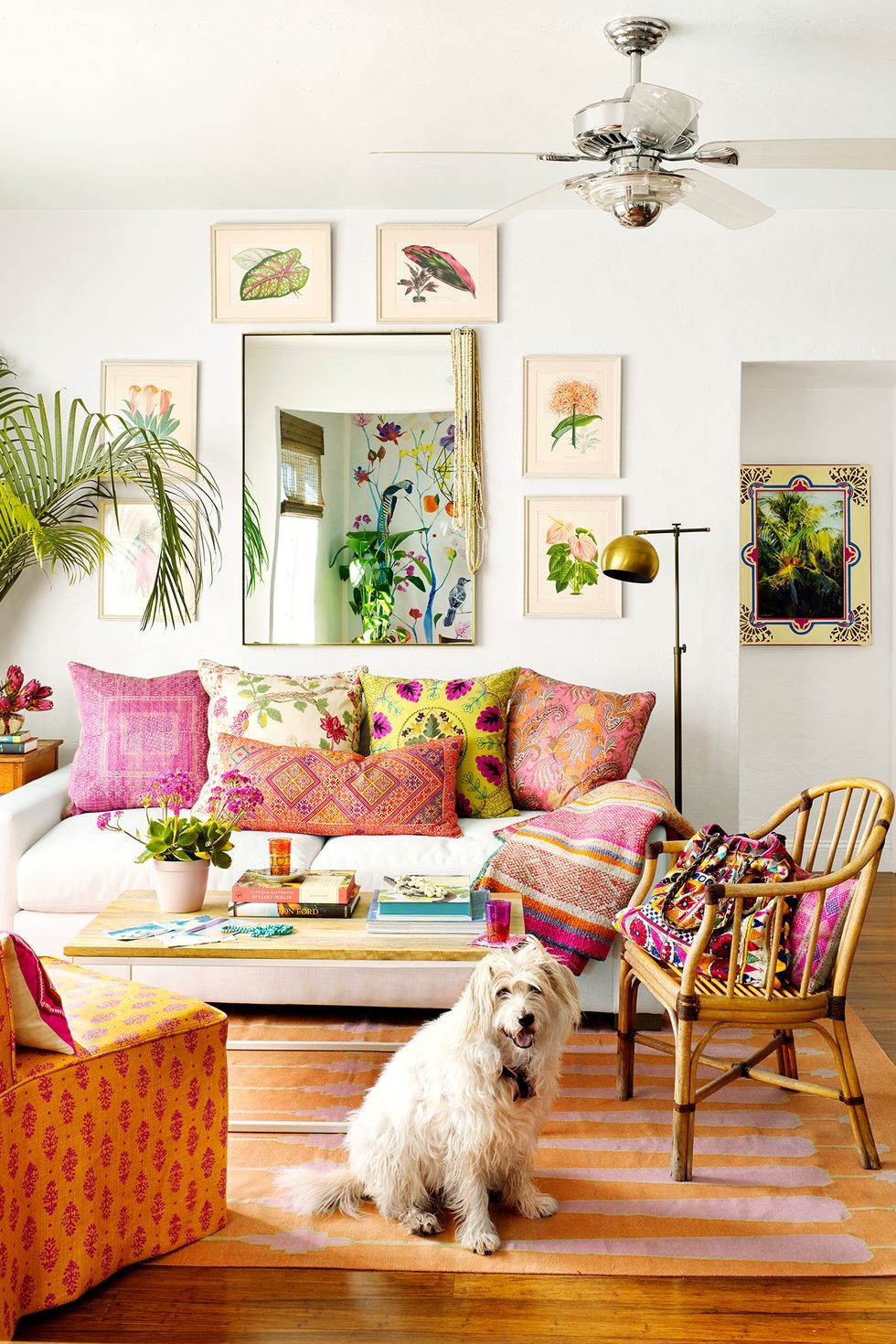 Bohemian Living Room with Textured Colorful Throw Pillows via Annie Schlechter