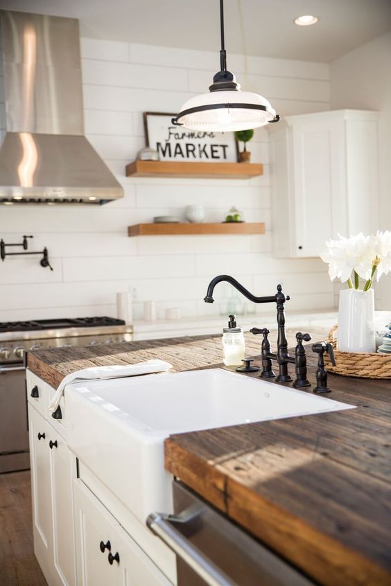 Farmhouse Kitchen Wood Countertops and Black Iron Fixtures