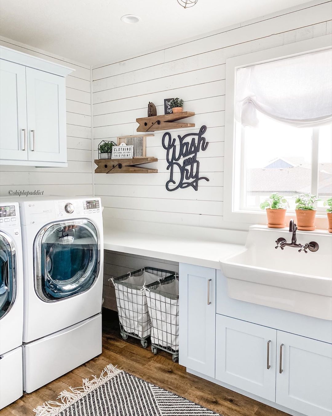 Farmhouse Laundry Room with Trough Sink and Shiplap Walls and Clothespin Shelving via @shiplapaddict