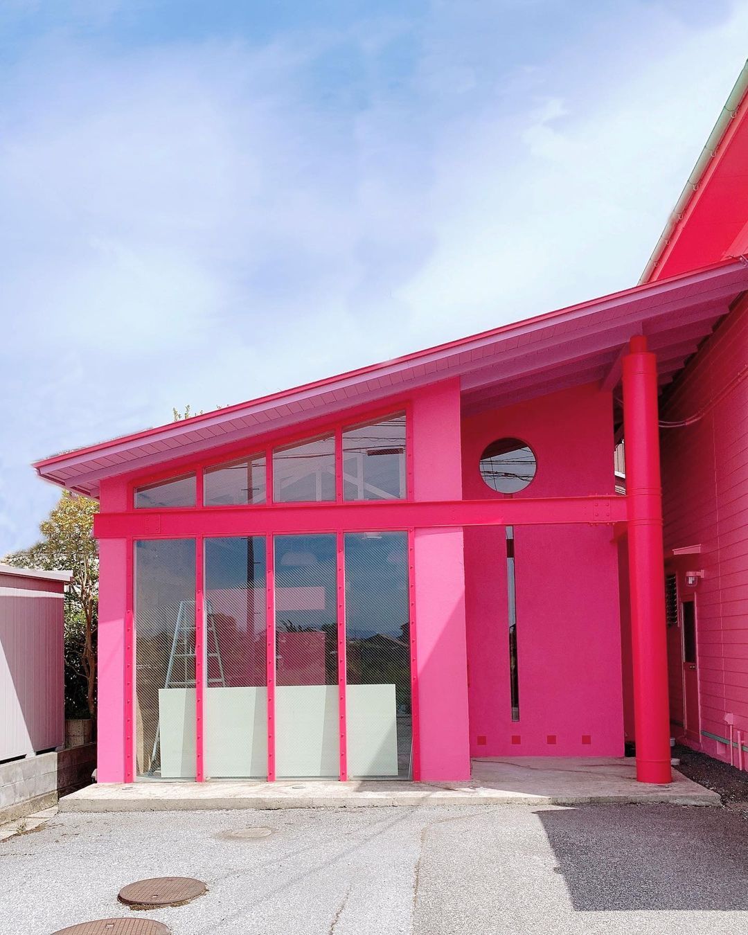 Fluorescent Pink House with Slanted Roof in Shiga Japan via @namikomori