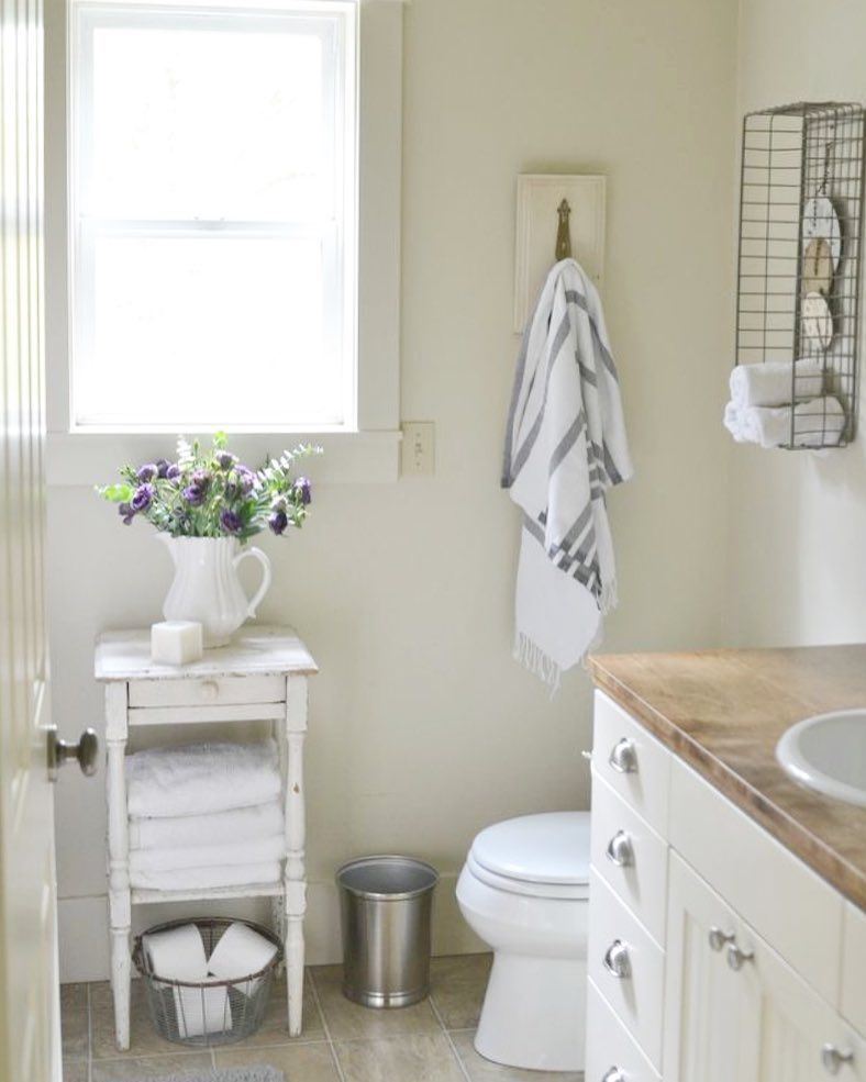 French Country Bathroom with Blue Striped Bath Towel via @fadedcharmliving