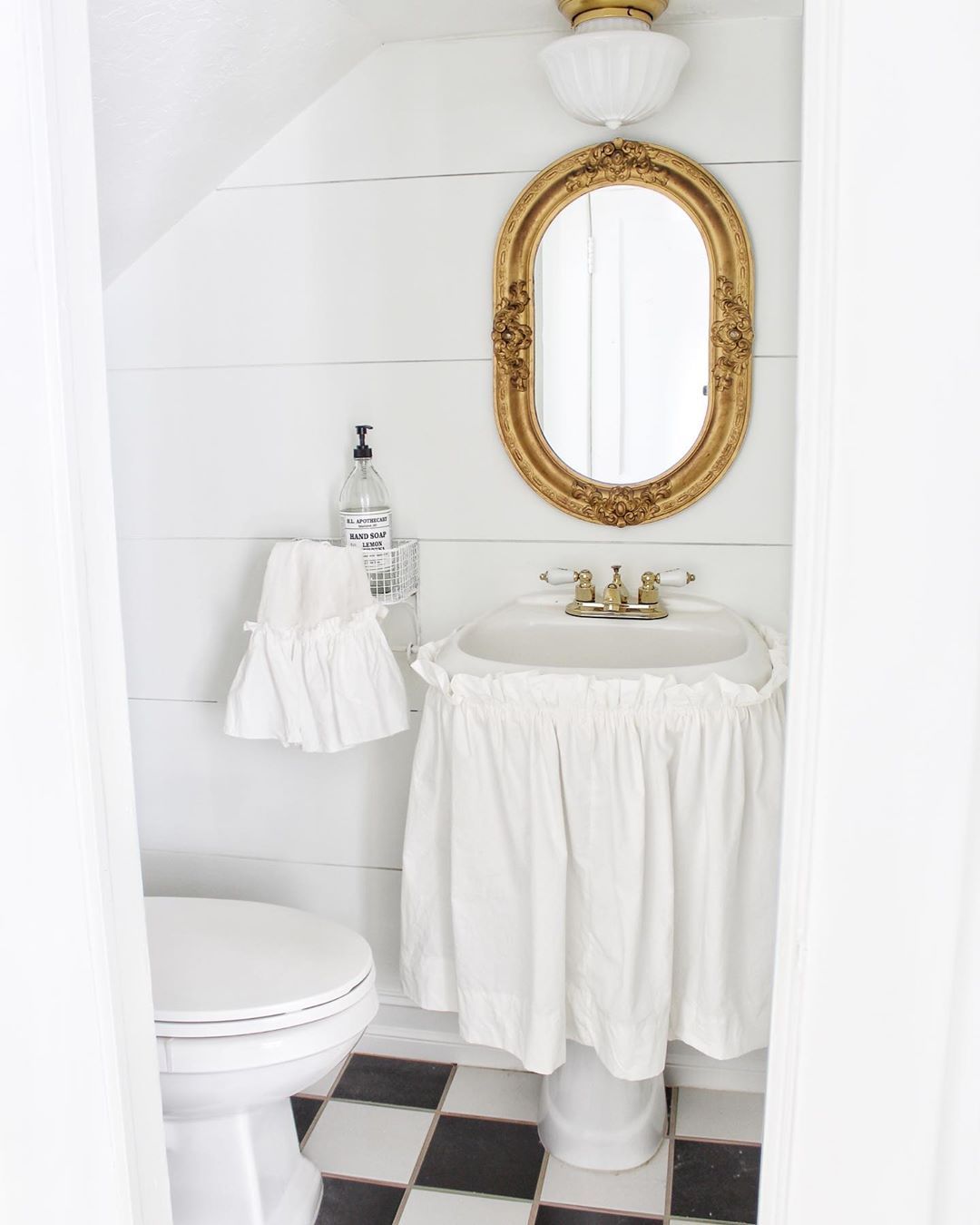 French Country Bathroom with Ruffle Skirt Around Sink via @simplyfrenchmarket