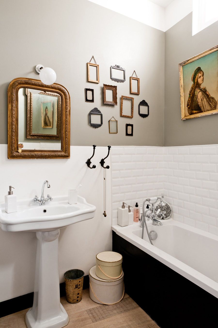 French Country Bathroom with Vintage Gold Frames on wall via SMP Julien Fernandez
