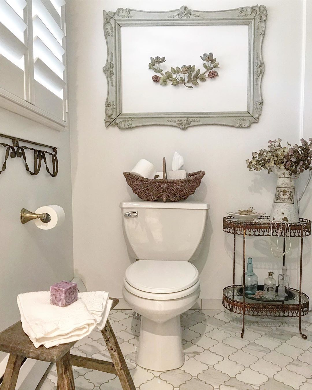 French Country Bathroom with Wicker Basket for Toilet Paper via @rarecorners