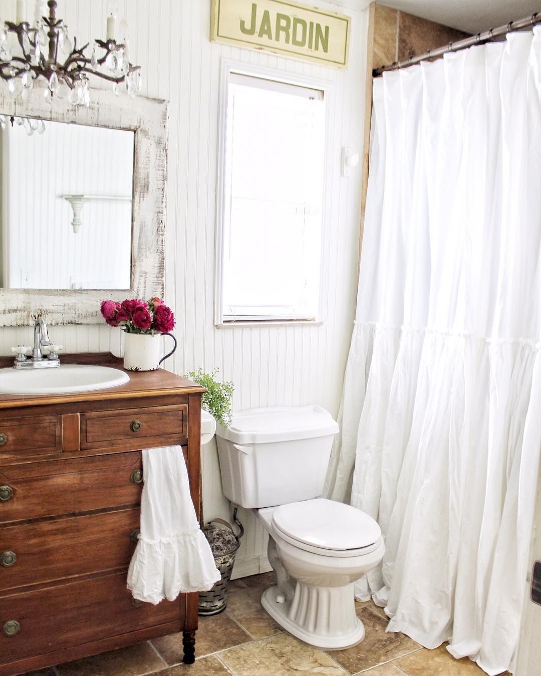 French Country Bathroom with Wood Dresser Sink Vanity via @simplyfrenchmarket