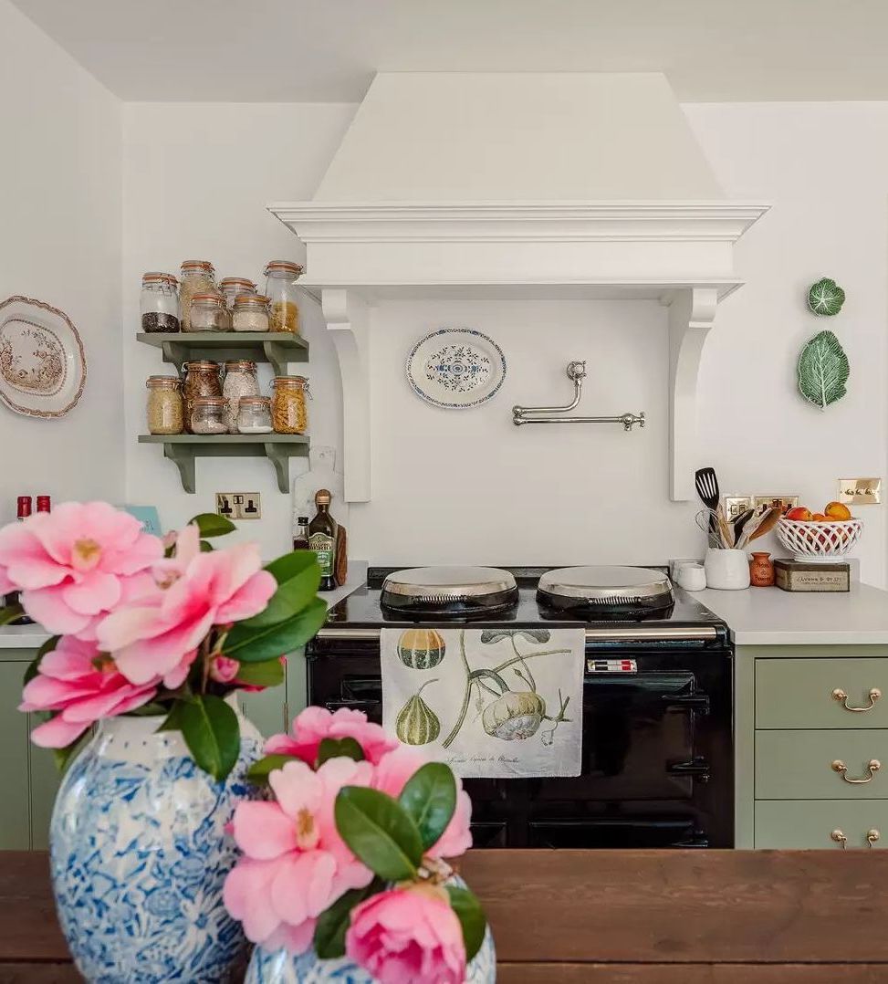 Ginger Jars used as Flower Pots in English Country Kitchen of Louise Roe via House and Garden UK
