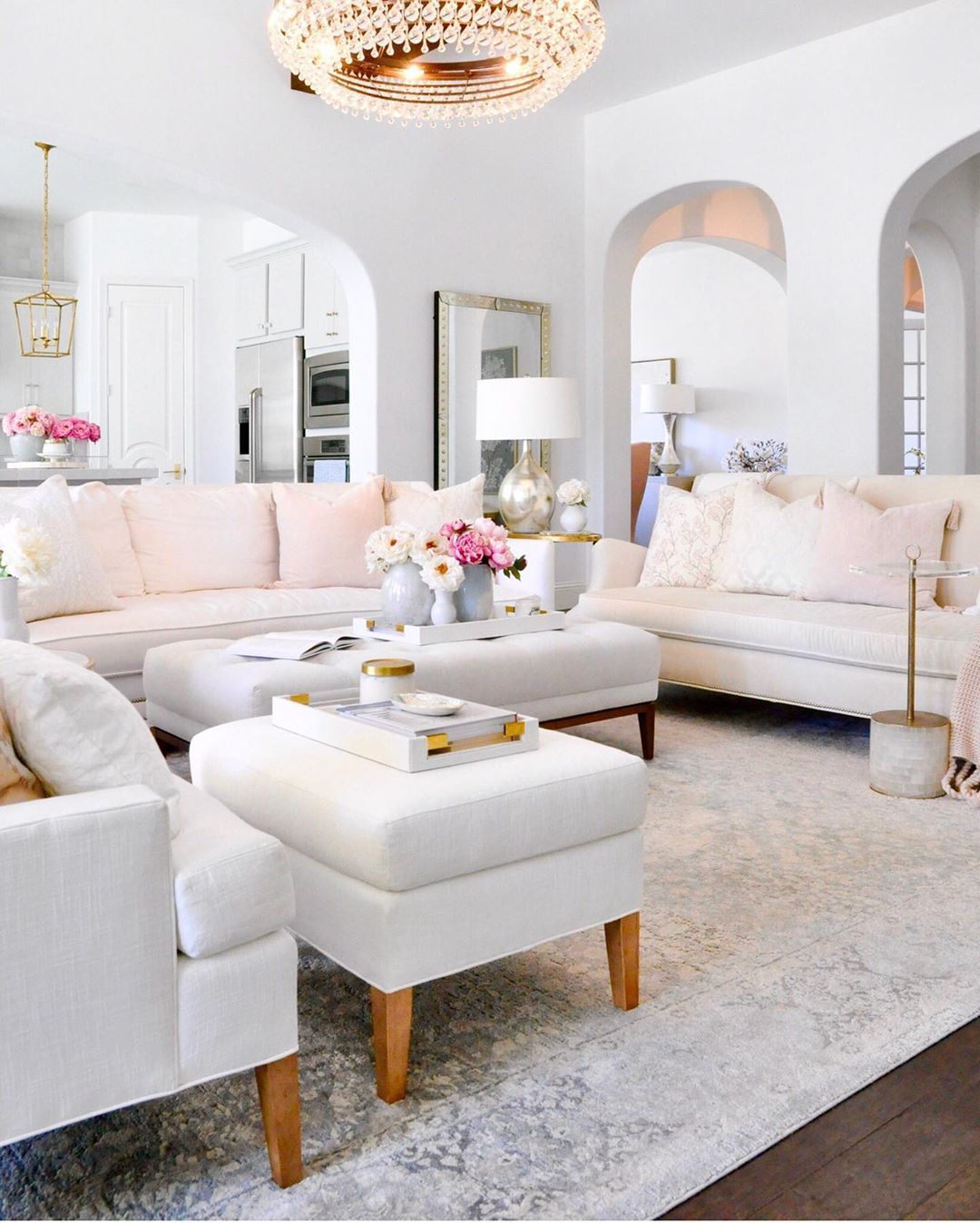 Glam Living Room with Ottomans as Coffee Tables via @decorgold