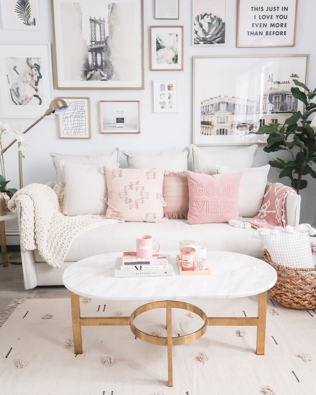 Glam Living Room with Pink Throw Pillows on a Beige Couch via @teresalaucar