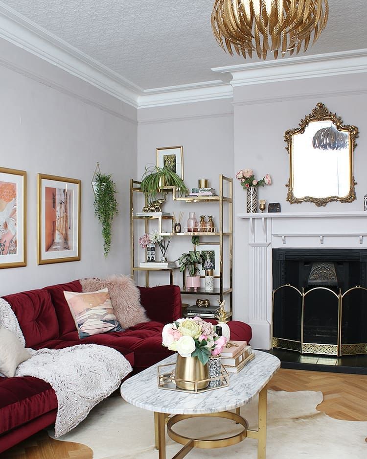 Glam Living Room with Red Velvet Sofa via @swoonworthyblog