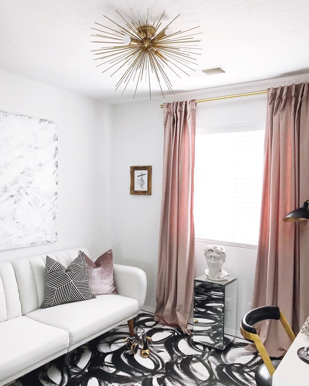 Glam Living Room with Pink Curtains and Starburst Chandelier via @the_beautiful_savages