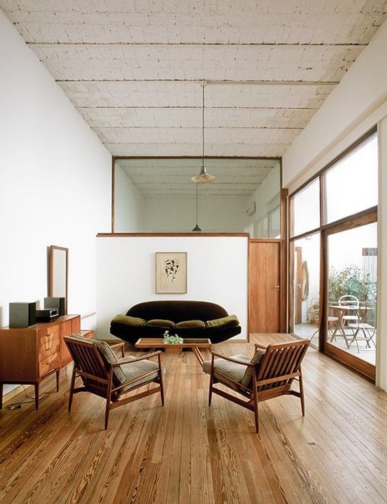Mid-Century Modern Living Room with Dark Green Velvet Sofa