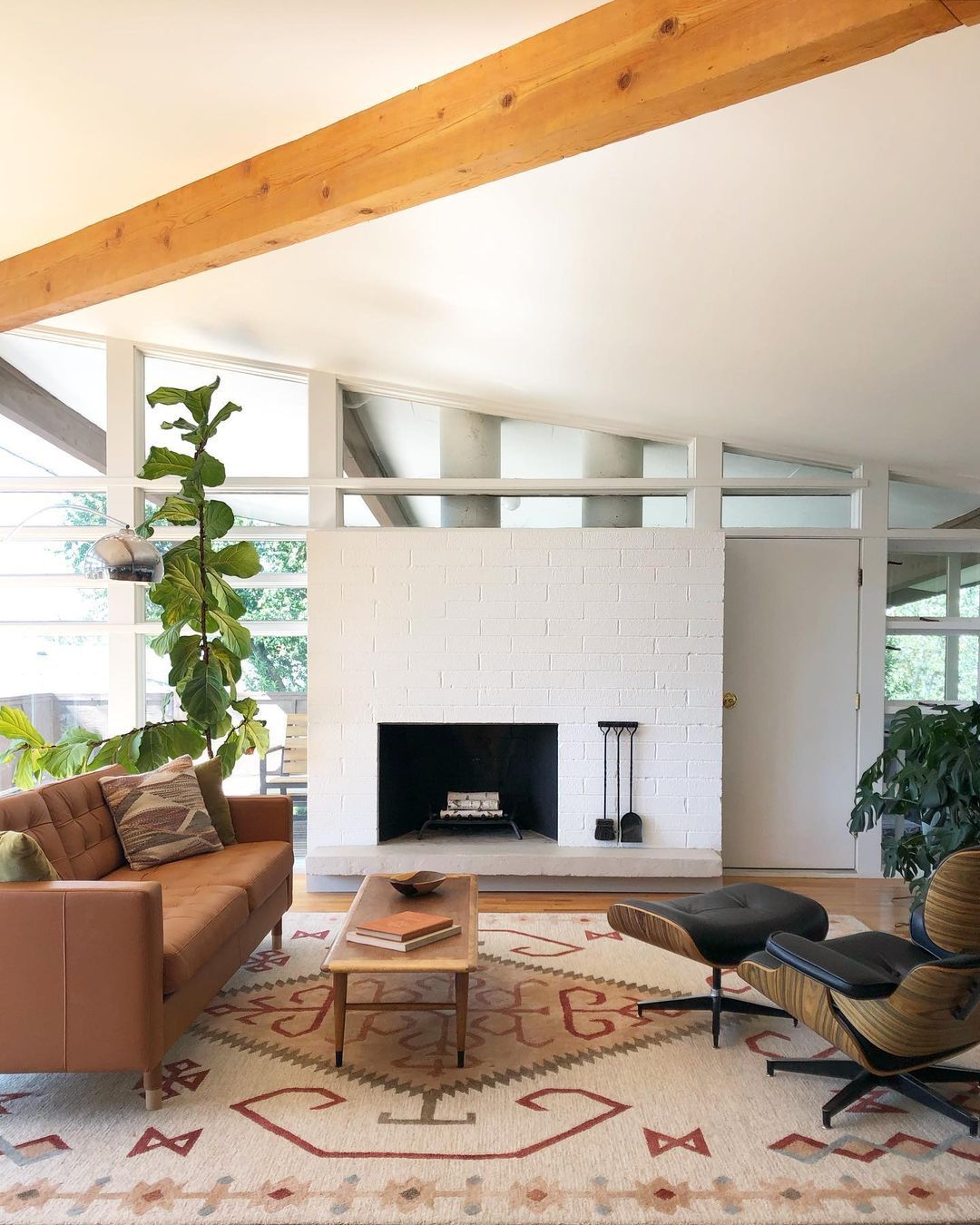 Mid-Century Modern Living Room with Exposed Wood Ceiling Beam via @postandbeamliving