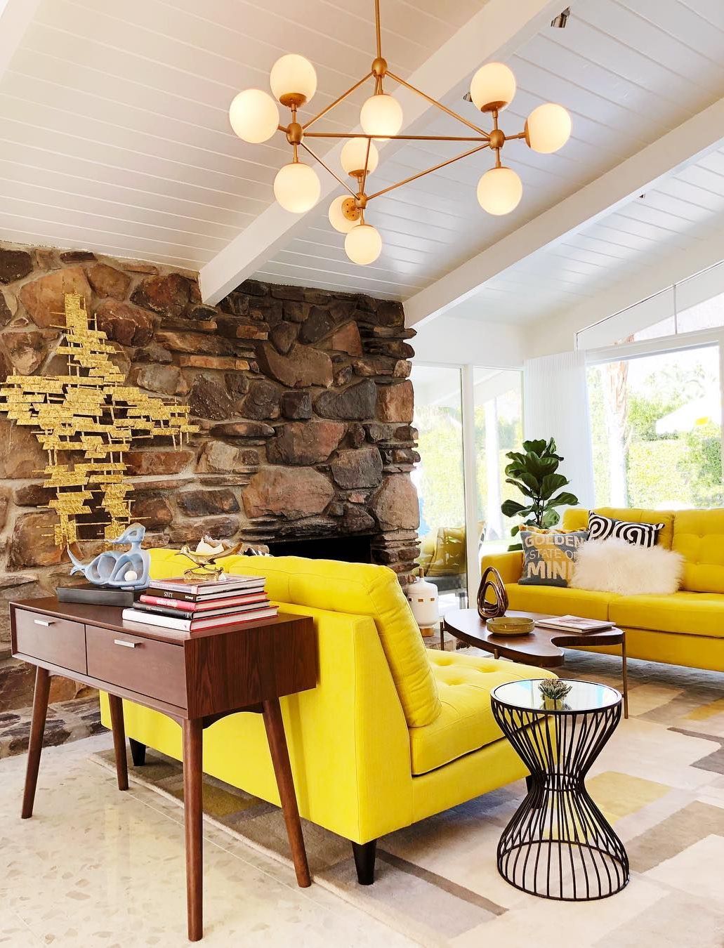 Mid-Century Modern Living Room with Stone Accent Wall via @h3kdesign