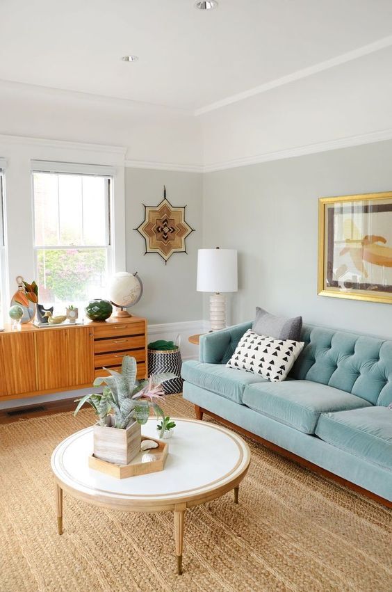 Mid-Century Modern Living Room with Teal Blue Couch