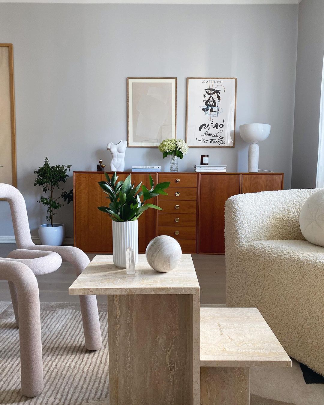 Mid-Century Modern Living Room with White Wool Accent Chair via @mdezeiner