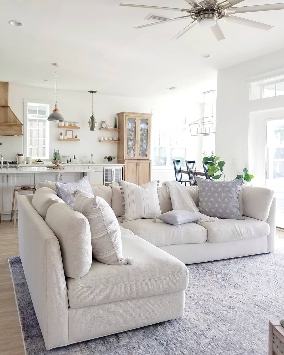 Neutral Living Room with Faded Blue Throw Pillows via @carcabaroad