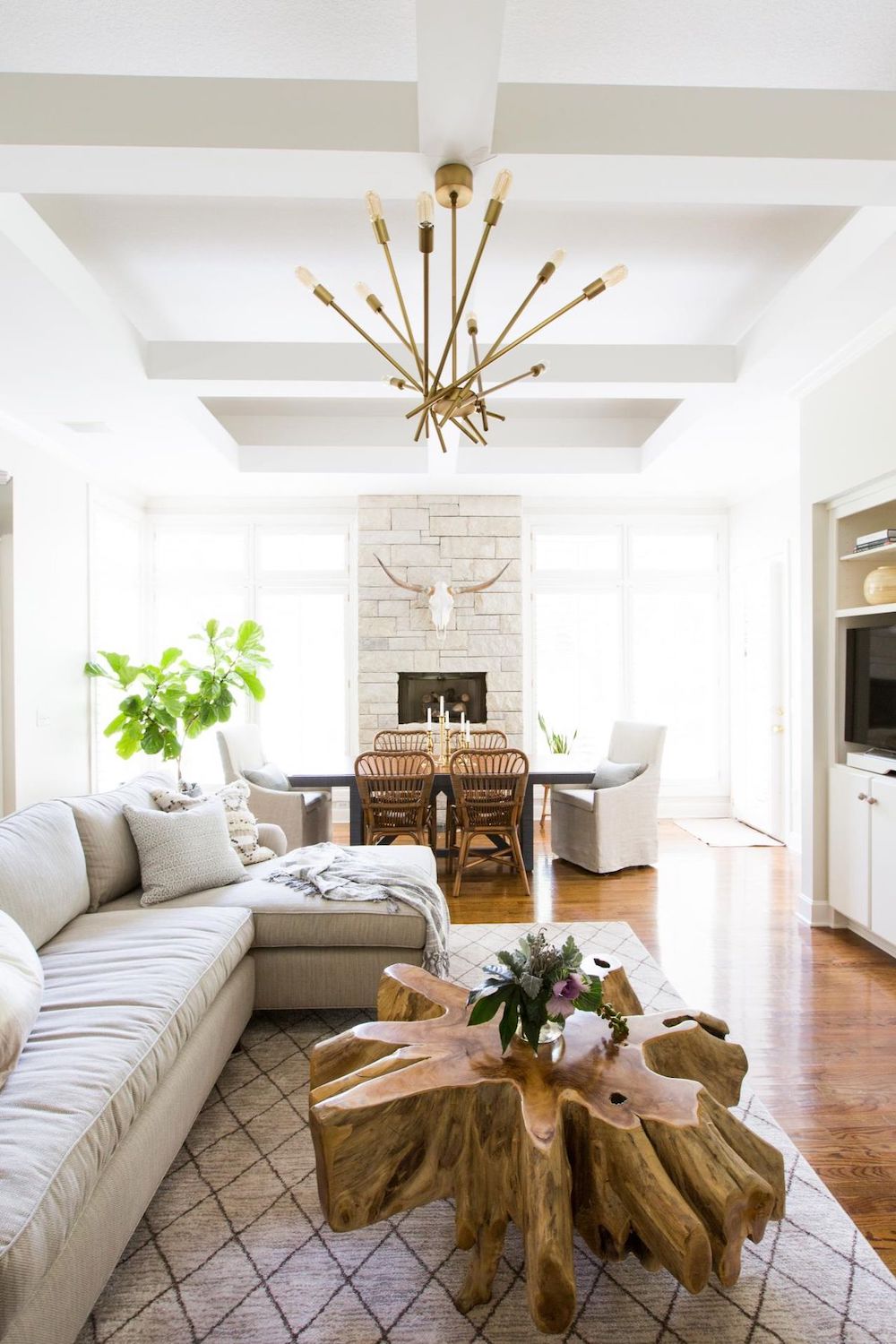 Neutral Living Room with Live Edge Coffee Table via HGTV Jaclyn Joslin