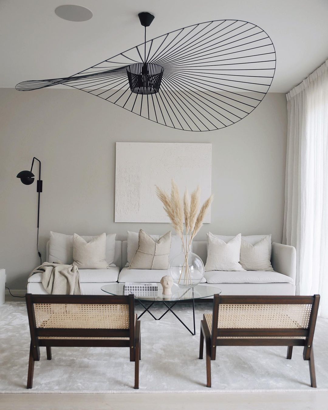 Neutral Living Room with Pampas Grass Decor via @emmamelins