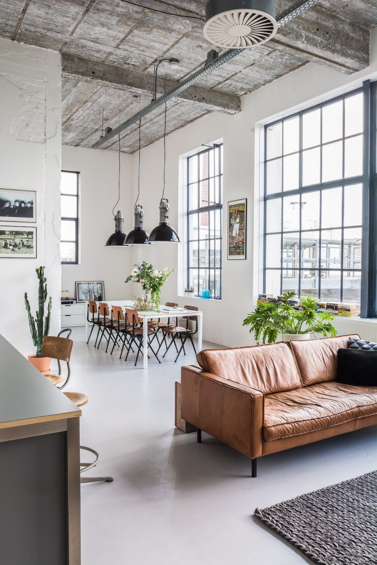 Open Layout Loft Space Industrial Living Room Decor via everythingelze