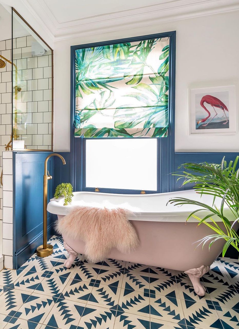 Pink Flamingo Wall Art in a Tropical bathroom with a soft pink bathtub via @threeboysandapinkbath