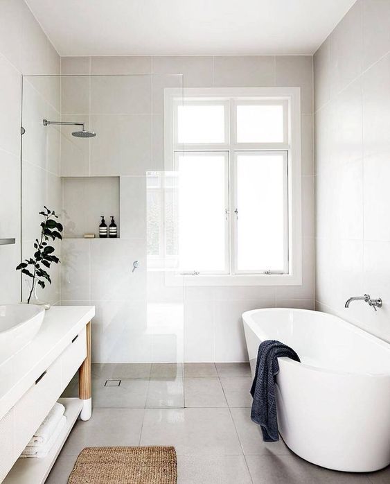 Scandinavian Bathroom with Jute Rug and Large Gray Square Tiling