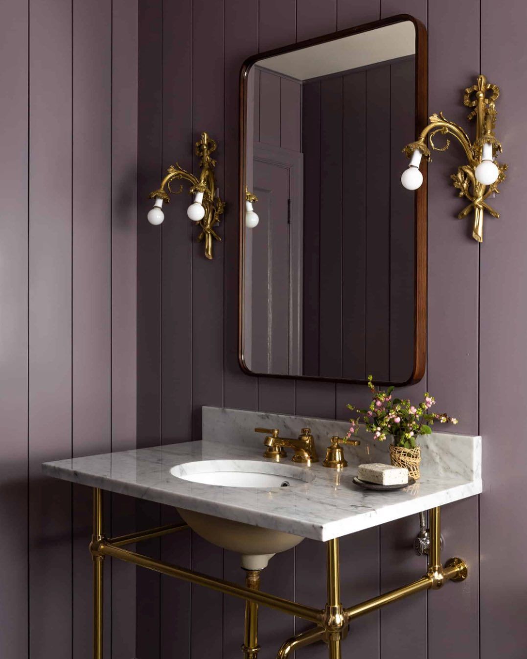 Wainscoting in Dark Purple English Traditional Bathroom via @heidicaillierdesign