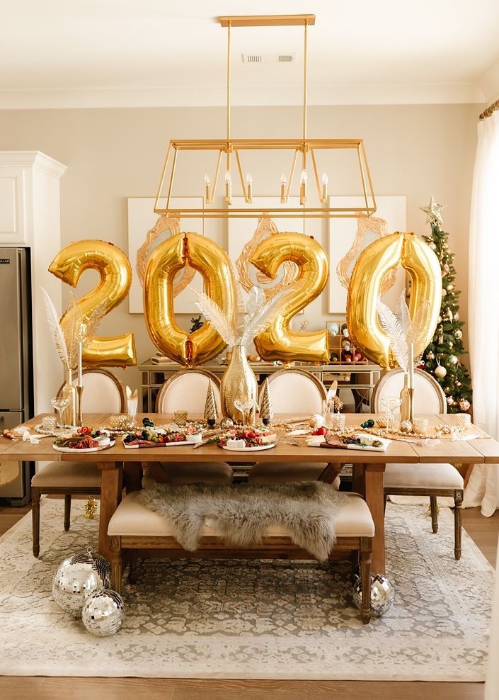 New Year's eve decor with giant 2020 year digit balloons via hauteofftherack