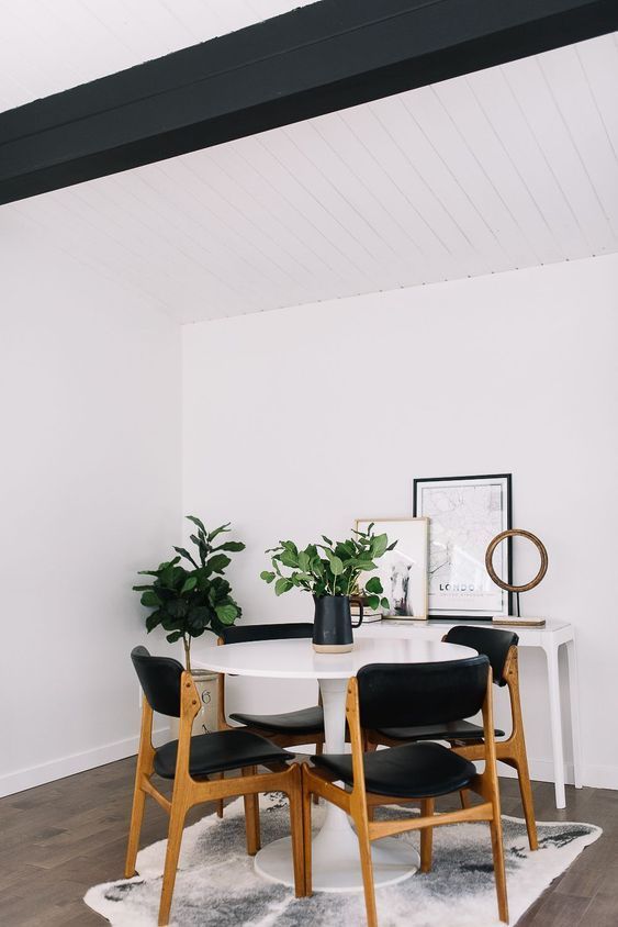 Black and White Mid-Century Modern Dining Room with Tulip Table