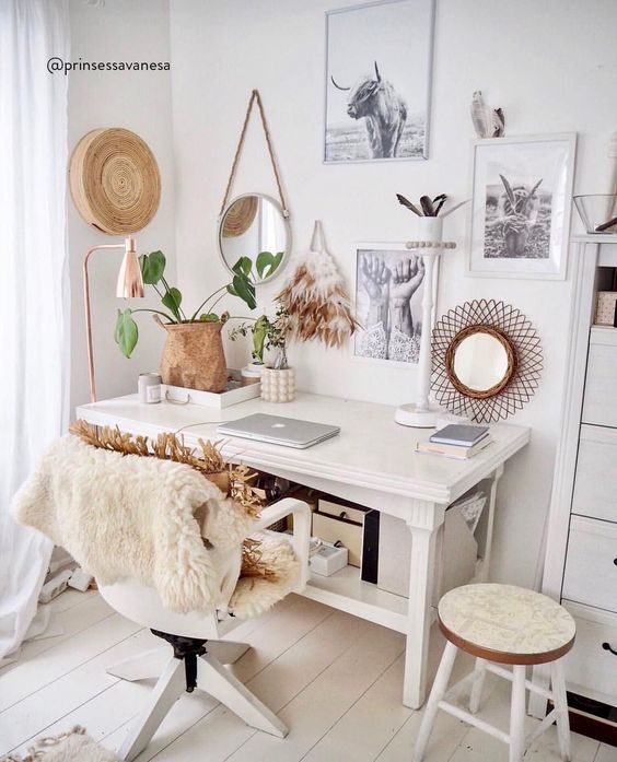 Black-and-white-photography-in-Bohemian-home-office-decor-via-@prinsessavanessa.jpg