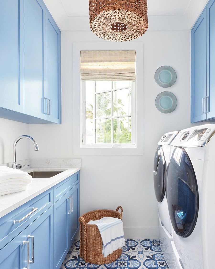 Blue Cabinets in a Coastal Laundry Room with Sky Blue Cabinets via @karahebertinteriors