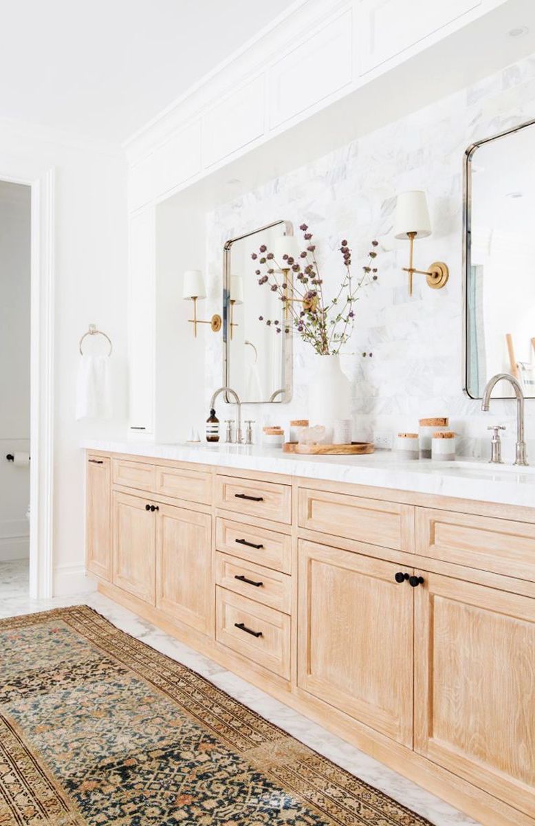 Brown Oriental Rug in Neutral Bathroom via Amber Interiors