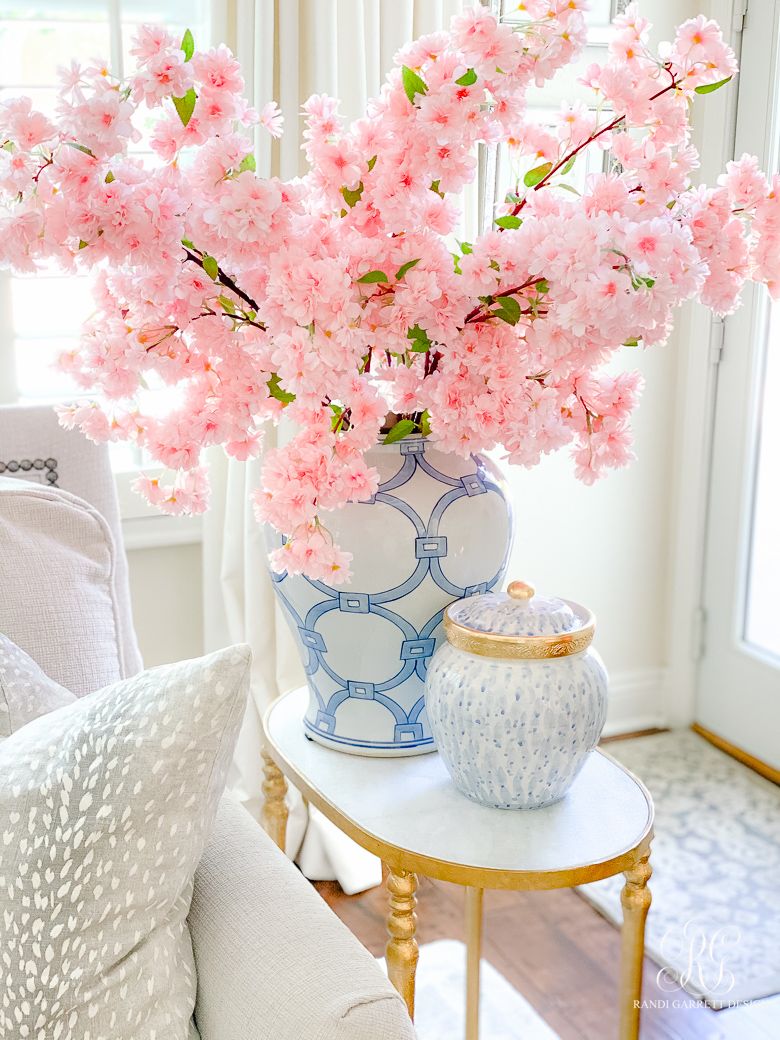 Cherry Blossoms in a Blue Ginger Jar - Easy spring home decor ideas for the living room via Randi Garrett