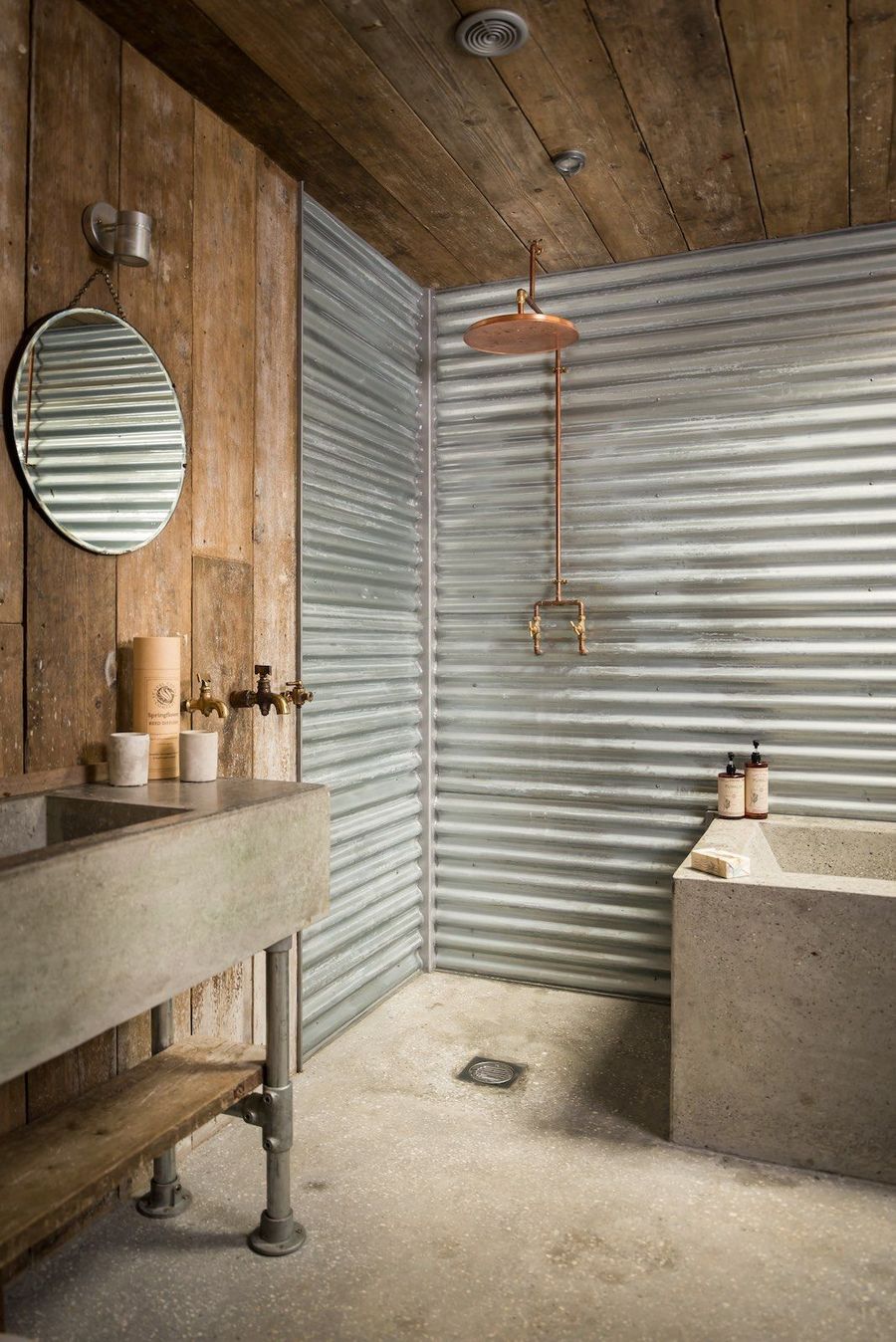 Corrugated Steel Walls And Concrete Vanity With Metal Legs Via Unique Home Stays 