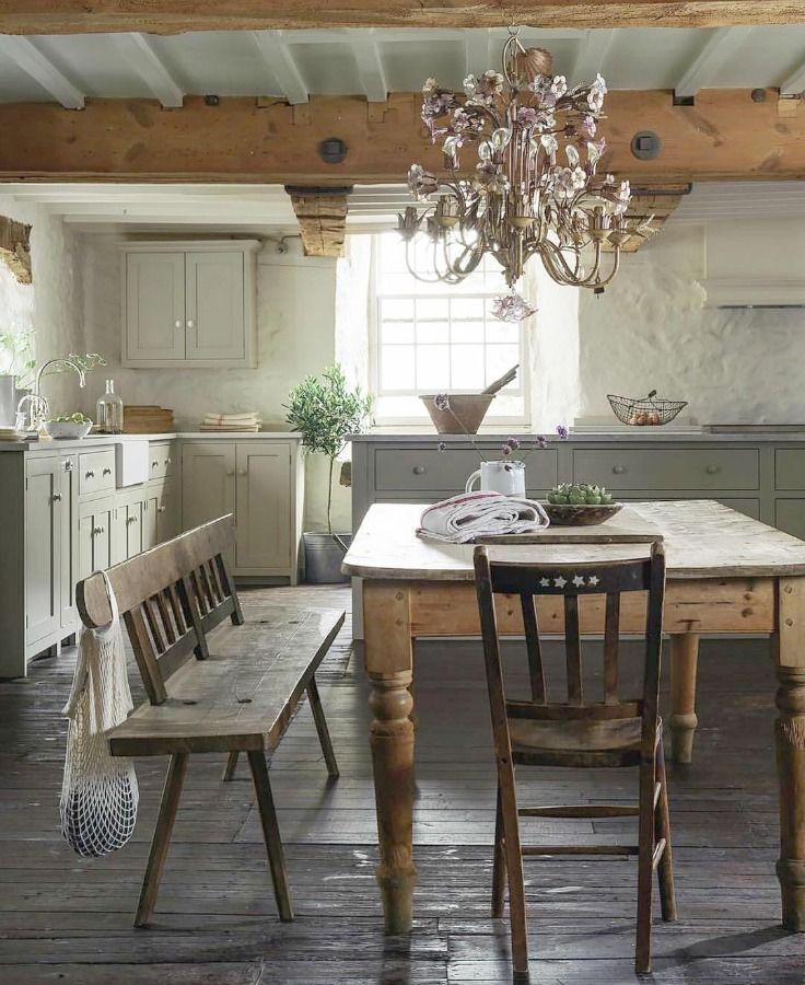 Crystal Chandelier In A Rustic English Country Kitchen Via DeVol Kitchens 