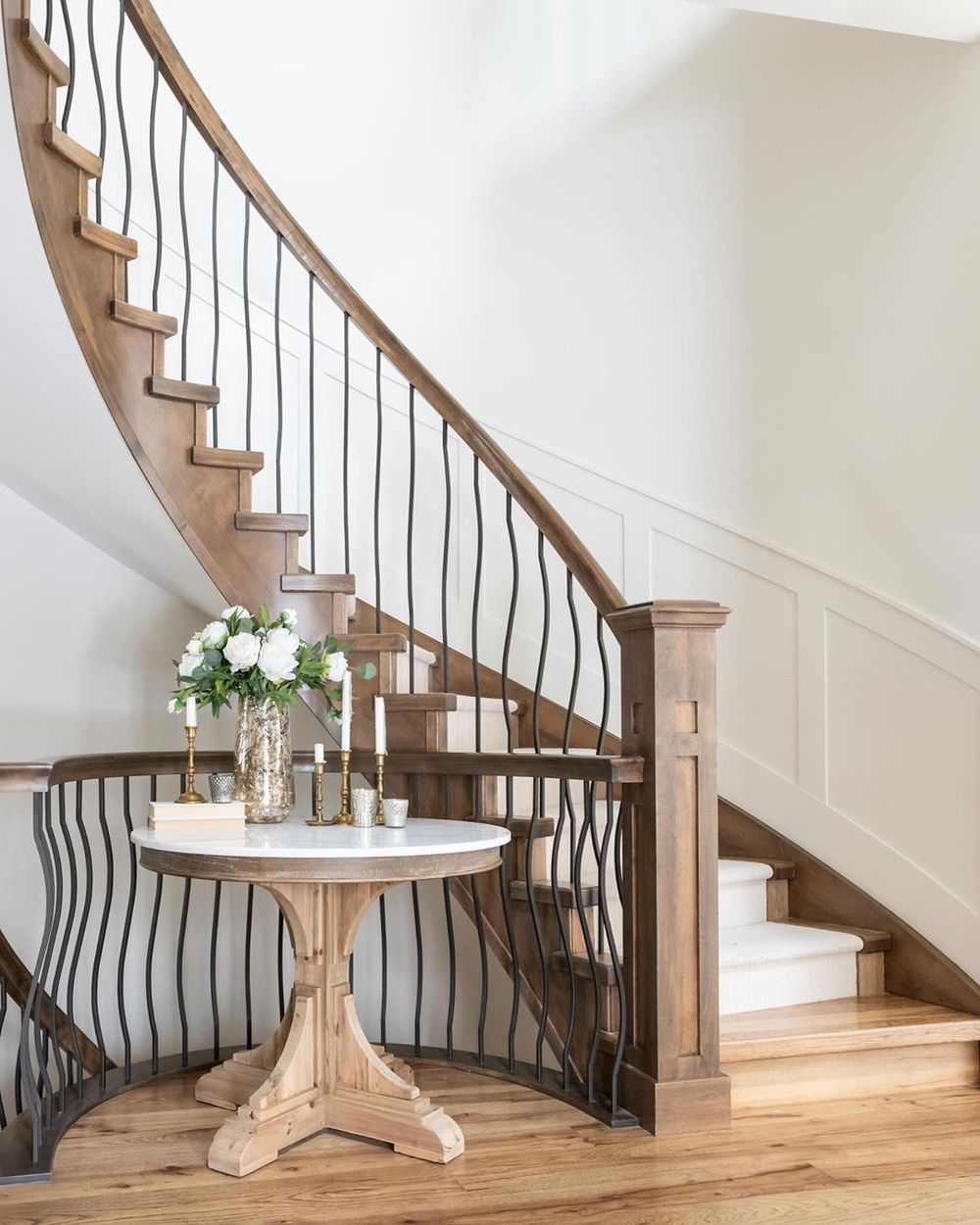 Curved Staircase in a French Country Entryway via @decoratinglife.ca