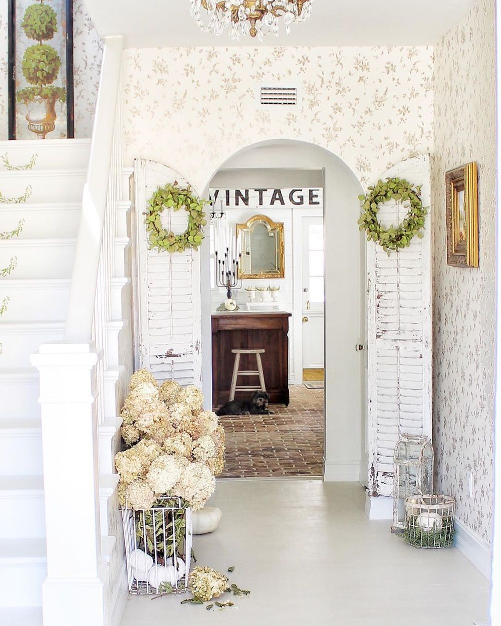 Distressed wood shutters in a French Country Entryway via @simplyfrenchmarket