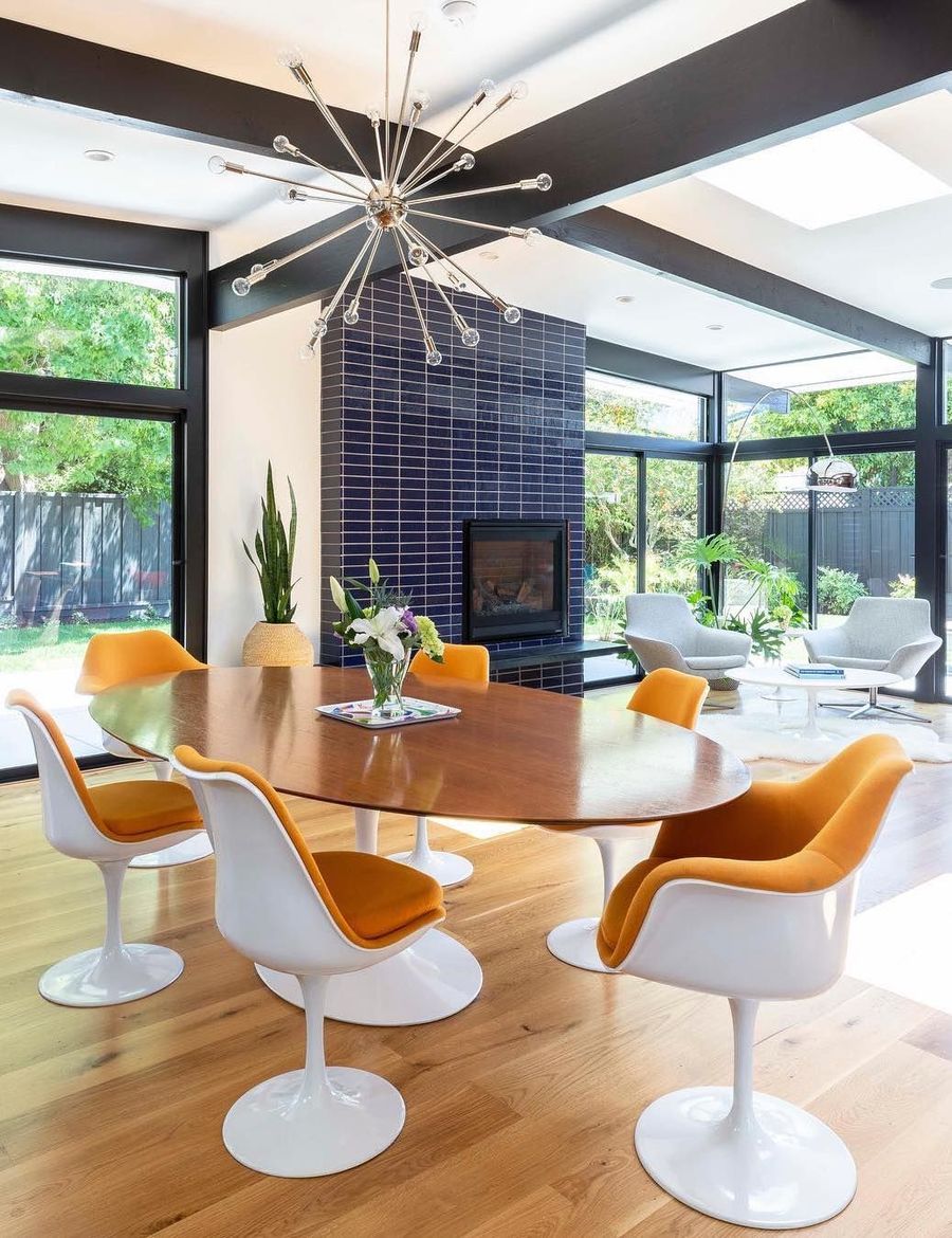 Eero Saarinen Tulip Chairs and Wood Tulip Table in a Mid-Century Modern Dining Room with Chairs via @destinationeichler