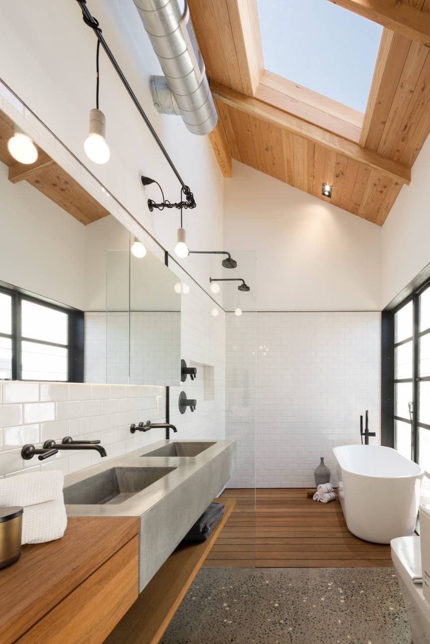 Exposed Pipes in Industrial Bathroom via Jason Roehner