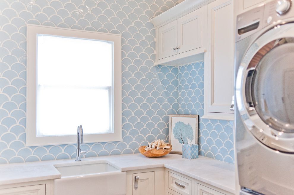 Fish Scale Tile in Blue Coastal Laundry Room via Dove Studio