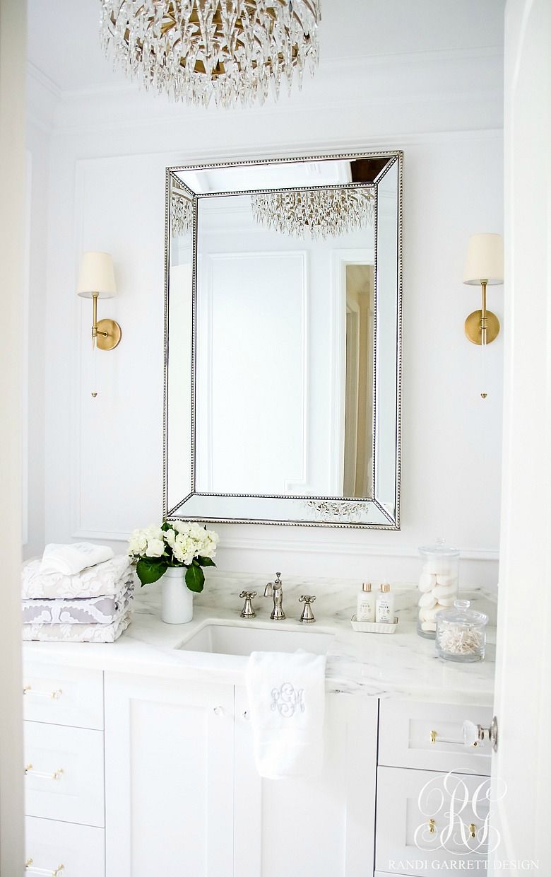 Glam bathroom with Crystal Lighting via randigarrettdesign