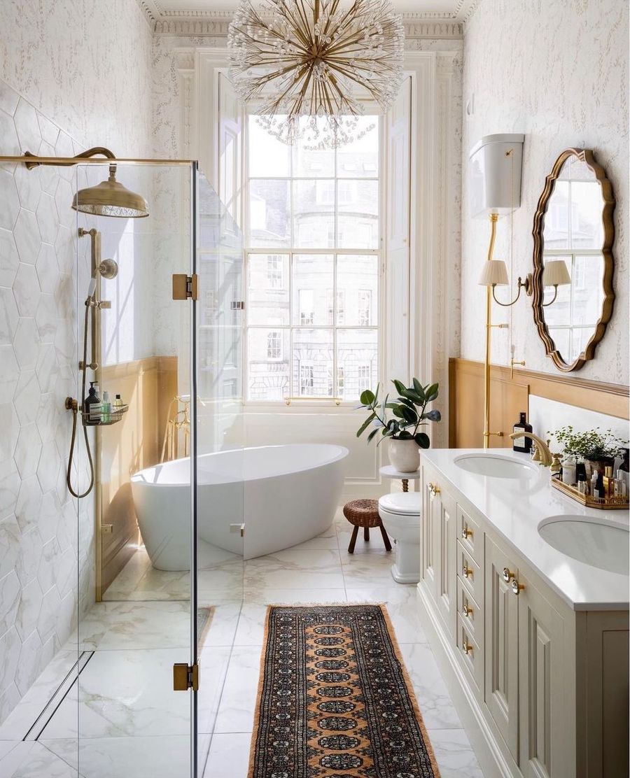 Gold Starburst Chandelier in Neutral Bathroom Decor via @interiors.by.lisa.guest
